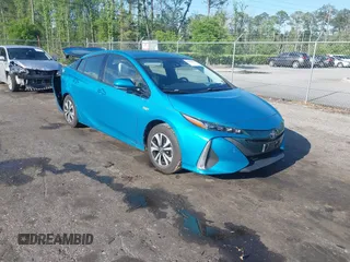 2018 Toyota Prius Plus with VIN JTDKARFPXJ3077974, listed as a IAAI auction lot 41996094 with 44,817 mi miles and . Bid and sale history available at DreamBid. Image 1.