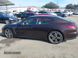 2015 Porsche Panamera 4 z VIN WP0AA2A76FL000746, wystawiony jako IAAI lot #41411279 z przebiegiem 37 496 mil mil oraz . Historia ofert i sprzedaży dostępna na DreamBid. Obrazek 14.