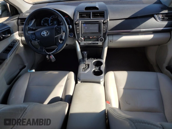 2012 Toyota Camry XLE z VIN 4T1BD1FK6CU010214, wystawiony jako Copart lot #57690544 z przebiegiem 77 943 mil mil oraz Szkoda całkowita • Salvage title. Historia ofert i sprzedaży dostępna na DreamBid. Obrazek 8.