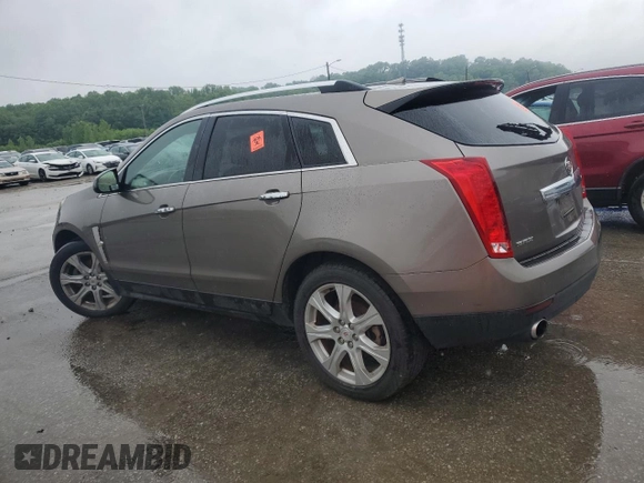 2011 Cadillac SRX Premium Collection with VIN 3GYFNCEY2BS661868, listed as a Copart auction lot 57813015 with 175,726 mi miles and Salvage title. Bid and sale history available at DreamBid. Image 2.