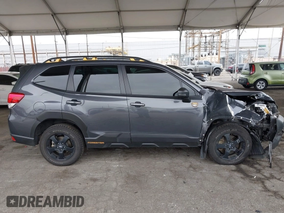 2023 Subaru Forester Wilderness with VIN JF2SKAMC4PH412075, listed as a IAAI auction lot 41885690 with 29,935 mi miles and . Bid and sale history available at DreamBid. Image 13.