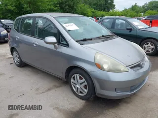2007 Honda Fit z VIN JHMGD374X7S004101, wystawiony jako IAAI lot #42477597 z przebiegiem 185 802 mil mil oraz . Historia ofert i sprzedaży dostępna na DreamBid. Obrazek 1.