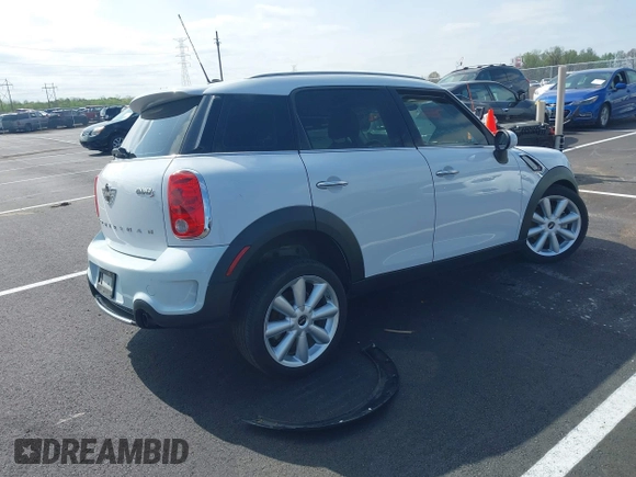 2016 MINI Countryman S with VIN WMWZC3C51GWT10458, listed as a IAAI auction lot 41878799 with 112,019 mi miles and . Bid and sale history available at DreamBid. Image 4.