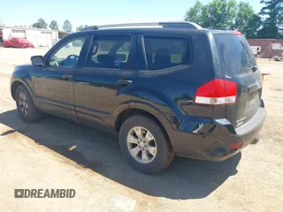 2009 Kia Borrego LX with VIN KNDJJ741395033538, listed as a IAAI auction lot 42088382 with 119,225 mi miles. Bid and sale history available at carsss.com. Image 3.