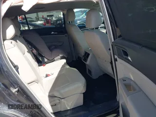 2018 Volkswagen Atlas SE with VIN 1V2DR2CA1JC546005, listed as a IAAI auction lot 41724133 with 116,633 mi miles and . Bid and sale history available at DreamBid. Image 8.