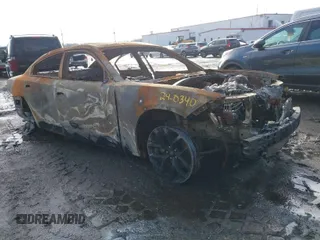 2022 Dodge Charger SXT with VIN 2C3CDXBG1NH166443, listed as a IAAI auction lot 41488607 with Not Provided miles and . Bid and sale history available at DreamBid. Image 1.