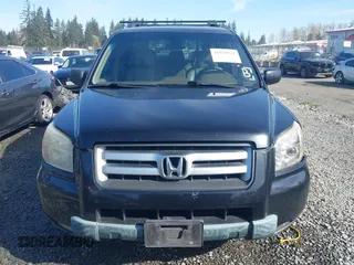 2006 Honda Pilot EX with VIN 5FNYF28466B049833, listed as a IAAI auction lot 41939721 with 238,995 mi miles and . Bid and sale history available at DreamBid. Image 12.