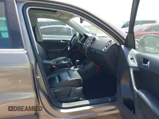 2011 Volkswagen Tiguan SEL w/Premium Navi with VIN WVGAV7AX0BW550059, listed as a IAAI auction lot 42071719 with 107,341 mi miles and . Bid and sale history available at DreamBid. Image 5.