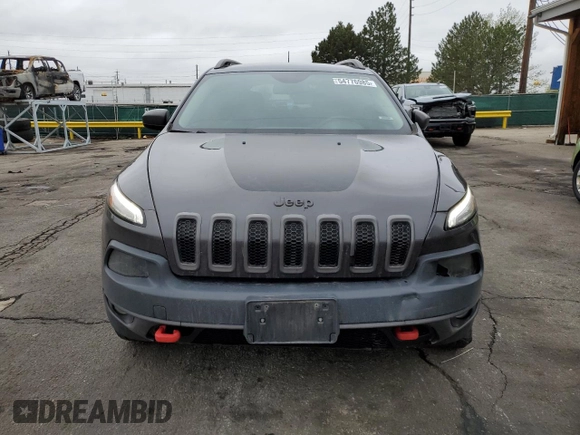 2016 Jeep Cherokee Trailhawk with VIN 1C4PJMBB0GW164437, listed as a Copart auction lot 54776985 with 158,801 mi miles and Salvage title. Bid and sale history available at DreamBid. Image 5.