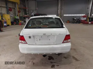 2000 Hyundai Accent с VIN KMHCG35G4YU024317, выставлен на аукционе IAAI как лот 41848880 с пробегом Не указан миль и . История ставок и продаж доступна на DreamBid. Изображение 17.