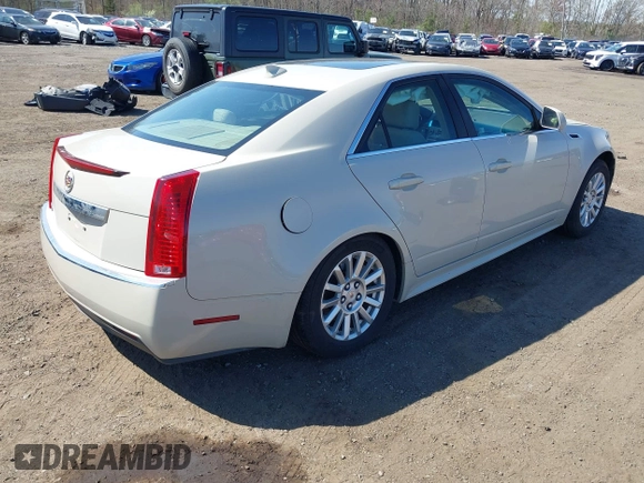 2011 Cadillac CTS Luxury with VIN 1G6DF5EY4B0114245, listed as a IAAI auction lot 42029416 with 83,473 mi miles and . Bid and sale history available at DreamBid. Image 4.