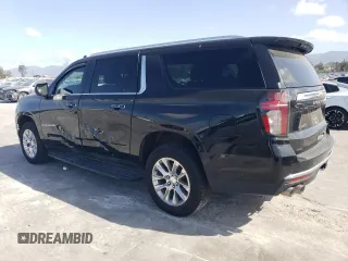 2023 Chevrolet Suburban Premier with VIN 1GNSKFKD8PR205665, listed as a Copart auction lot 51694655 with 27,882 mi miles and Salvage title. Bid and sale history available at DreamBid. Image 2.
