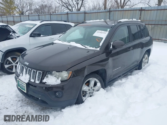 2014 Jeep Compass Latitude with VIN 1C4NJDEB1ED762578, listed as a IAAI auction lot 41244333 with 145,085 mi miles and . Bid and sale history available at carsss.com. Image 2.