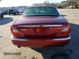 2004 Jaguar XJ VDP with VIN SAJWA74C14SG25722, listed as a Copart auction lot 84757994 with 62,152 mi miles and Salvage Title. Bid and sale history available at carsss.com. Image 6.
