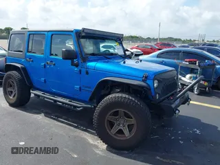 2015 Jeep Wrangler Unlimited Sport z VIN 1C4BJWDG1FL716400, wystawiony jako IAAI lot #42645745 z przebiegiem 83 199 mil mil oraz . Historia ofert i sprzedaży dostępna na DreamBid. Obrazek 1.