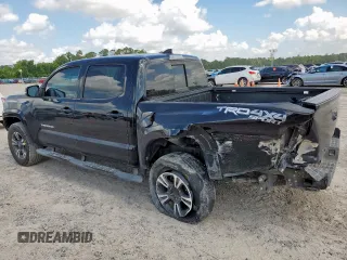 2017 Toyota Tacoma SR5 with VIN 5TFCZ5AN1HX102498, listed as a Copart auction lot 61499425 with 210,433 mi miles and Salvage title. Bid and sale history available at DreamBid. Image 2.