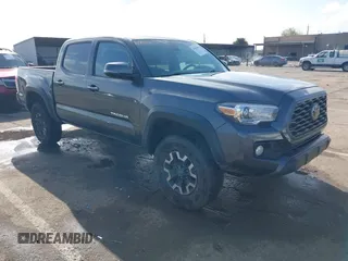 2020 Toyota Tacoma SR5 z VIN 3TMCZ5AN1LM328930, wystawiony jako IAAI lot #41955989 z przebiegiem 89 124 mil mil oraz . Historia ofert i sprzedaży dostępna na DreamBid. Obrazek 1.