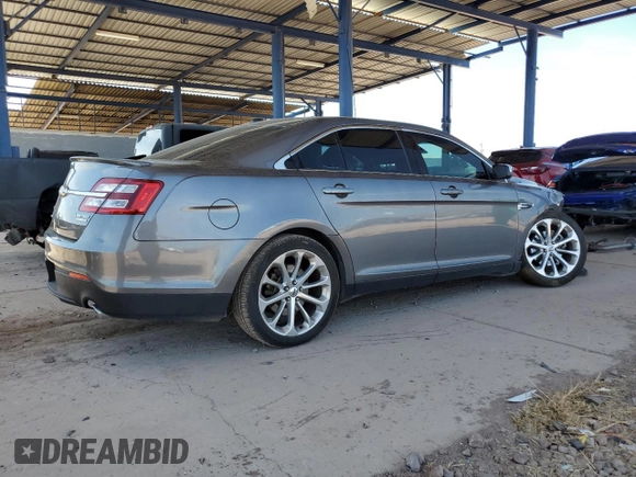 2014 Ford Taurus Limited с VIN 1FAHP2F88EG140714, выставлен на аукционе Copart как лот 58311785 с пробегом 74 794 миль миль и Списание • Salvage title. История ставок и продаж доступна на DreamBid. Изображение 3.