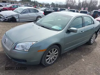 2006 Mercury Milan Premier z VIN 3MEHM08Z16R630899, wystawiony jako IAAI lot #41825986 z przebiegiem 168 042 mil mil oraz . Historia ofert i sprzedaży dostępna na DreamBid. Obrazek 17.