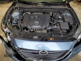 2015 Mazda 3 i Grand Touring z VIN 3MZBM1W75FM220907, wystawiony jako Copart lot #58464185 z przebiegiem 144 435 mil mil oraz Szkoda całkowita • Salvage title. Historia ofert i sprzedaży dostępna na DreamBid. Obrazek 11.