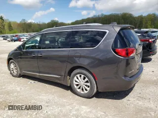 2018 Chrysler Pacifica Touring L with VIN 2C4RC1BG6JR124425, listed as a Copart auction lot 56132055 with 89,575 mi miles and Salvage Title. Bid and sale history available at DreamBid. Image 2.