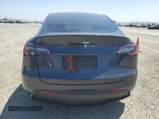 2024 Tesla Model Y с VIN 7SAYGDEDXRF095167, выставлен на аукционе Copart как лот 61676245 с пробегом 12 988 миль миль и Списание • Salvage title. История ставок и продаж доступна на DreamBid. Изображение 6.
