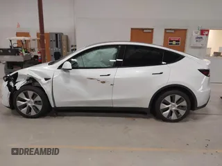 2022 Tesla Model Y Long Range z VIN 7SAYGDEE3NF358487, wystawiony jako IAAI lot #42036969 z przebiegiem 52 723 mil mil oraz . Historia ofert i sprzedaży dostępna na DreamBid. Obrazek 14.