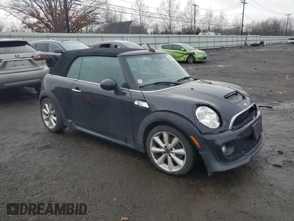 2015 MINI Convertible S with VIN WMWZP3C51FT708886, listed as a Copart auction lot 46860925 with 105,437 mi miles and Clean title. Bid and sale history available at DreamBid. Image 4.