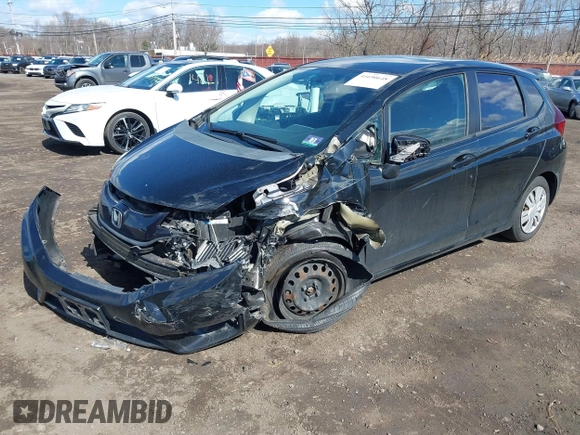 2015 Honda Fit LX z VIN 3HGGK5H51FM775176, wystawiony jako IAAI lot #41690648 z przebiegiem 49 979 mil mil oraz . Historia ofert i sprzedaży dostępna na DreamBid. Obrazek 2.