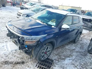 2021 Kia Seltos SX with VIN KNDETCA21M7185753, listed as a IAAI auction lot 41409356 with 68,430 mi miles. Bid and sale history available at carsss.com. Image 2.