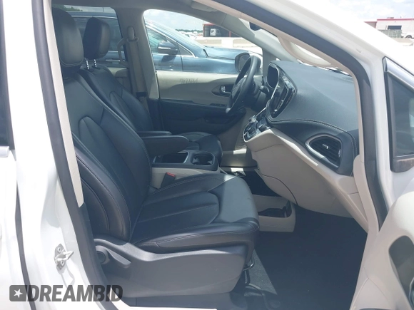 2023 Chrysler Pacifica Hybrid Touring L with VIN 2C4RC1L71PR622474, listed as a IAAI auction lot 42595061 with 55,880 mi miles and . Bid and sale history available at DreamBid. Image 5.