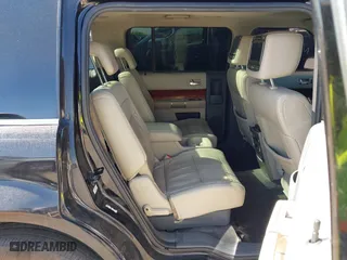 2009 Ford Flex Limited with VIN 2FMEK63C19BA71966, listed as a IAAI auction lot 42080381 with 143,418 mi miles. Bid and sale history available at carsss.com. Image 8.