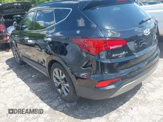 2017 Hyundai Santa Fe Ultimate z VIN 5NMZW4LA1HH052430, wystawiony jako IAAI lot #42205489 z przebiegiem 85 720 mil mil oraz . Historia ofert i sprzedaży dostępna na DreamBid. Obrazek 3.