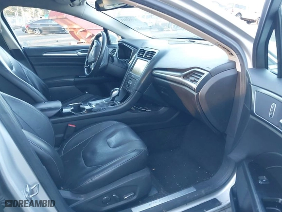 2015 Ford Fusion Energi Titanium with VIN 3FA6P0SU8FR264846, listed as a IAAI auction lot 41552443 with 160,142 mi miles. Bid and sale history available at carsss.com. Image 5.