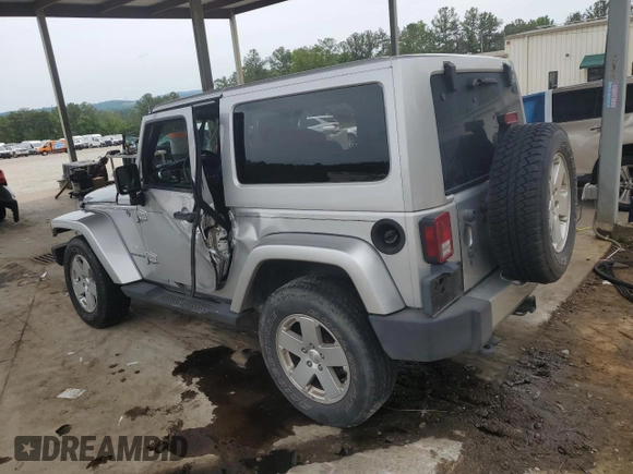 2011 Jeep Wrangler Sahara with VIN 1J4AA5D13BL546742, listed as a Copart auction lot 56415765 with 60,454 mi miles and Salvage title. Bid and sale history available at DreamBid. Image 2.