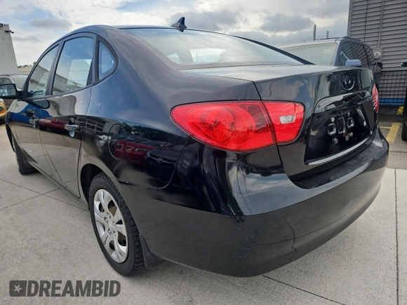 2009 Hyundai Elantra SE with VIN KMHDU46DX9U815198, listed as a Copart auction lot 61820665 with 92,543 mi miles and Clean title. Bid and sale history available at DreamBid. Image 3.