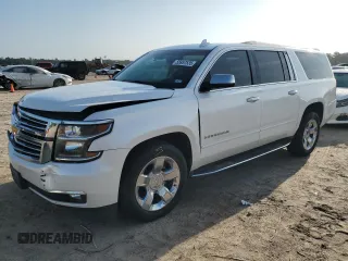 2017 Chevrolet Suburban Premier z VIN 1GNSCJKCXHR348044, wystawiony jako Copart lot #55957535 z przebiegiem 112 131 mil mil oraz Szkoda całkowita • Salvage title. Historia ofert i sprzedaży dostępna na DreamBid. Obrazek 1.