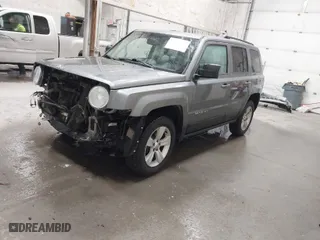 2014 Jeep Patriot Latitude with VIN 1C4NJRFB6ED617208, listed as a IAAI auction lot 41655155 with 92,220 mi miles. Bid and sale history available at carsss.com. Image 2.