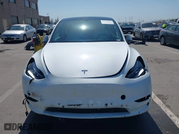 2021 Tesla Model Y Long Range with VIN 5YJYGDEEXMF280480, listed as a IAAI auction lot 41993633 with 69,579 mi miles. Bid and sale history available at carsss.com. Image 13.