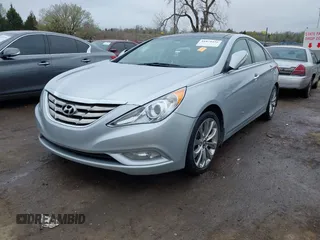 2012 Hyundai Sonata SE with VIN 5NPEC4AB1CH434939, listed as a IAAI auction lot 41878416 with 123,028 mi miles and . Bid and sale history available at DreamBid. Image 2.