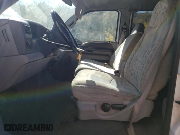 2000 Ford F-350 XL with VIN 1FTSW31F5YEA50810, listed as a Copart auction lot 83274144 with 147,370 mi miles and Salvage Title. Bid and sale history available at DreamBid. Image 7.