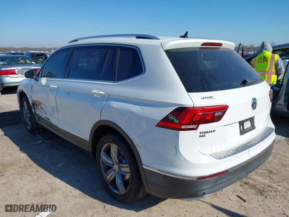 2019 Volkswagen Tiguan SEL Premium with VIN 3VV4B7AX0KM007788, listed as a IAAI auction lot 41227707 with 67,859 mi miles. Bid and sale history available at carsss.com. Image 3.