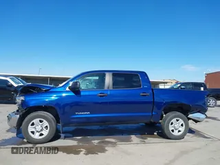 2015 Toyota Tundra SR5 z VIN 5TFEM5F16FX091122, wystawiony jako IAAI lot #41623318 z przebiegiem 178 557 mil mil oraz . Historia ofert i sprzedaży dostępna na DreamBid. Obrazek 15.