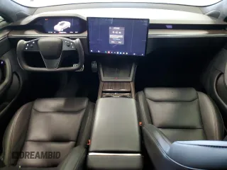 2022 Tesla Model S с VIN 5YJSA1E5XNF488415, выставлен на аукционе Copart как лот 57347565 с пробегом 18 662 миль миль и Списание • Salvage title. История ставок и продаж доступна на DreamBid. Изображение 8.