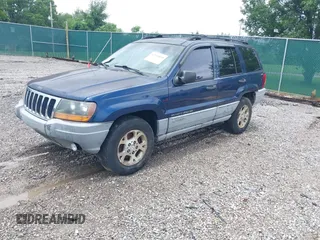 2000 Jeep Grand Cherokee Laredo z VIN 1J4GW48S9YC338947, wystawiony jako IAAI lot #42545830 z przebiegiem 234 251 mil mil oraz . Historia ofert i sprzedaży dostępna na DreamBid. Obrazek 2.