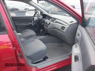 2003 Mitsubishi Lancer ES with VIN JA3AJ26E13U107196, listed as a IAAI auction lot 41745889 with 182,515 mi miles. Bid and sale history available at carsss.com. Image 5.