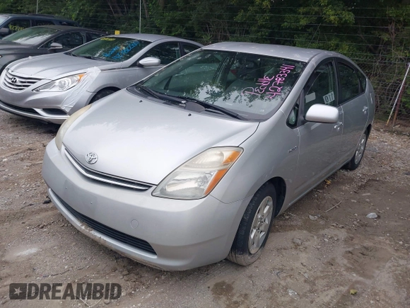 2007 Toyota Prius with VIN JTDKB20U777612716, listed as a IAAI auction lot 42783341 with 129,702 mi miles and . Bid and sale history available at DreamBid. Image 2.