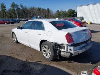 2015 Chrysler 300 Limited with VIN 2C3CCAAG3FH872168, listed as a IAAI auction lot 41967236 with 173,620 mi miles. Bid and sale history available at carsss.com. Image 3.