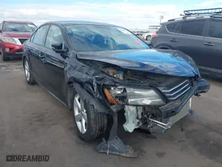 2014 Volkswagen Passat Wolfsburg Ed with VIN 1VWAT7A38EC053058, listed as a IAAI auction lot 41342514 with 114,730 mi miles. Bid and sale history available at carsss.com. Image 1.