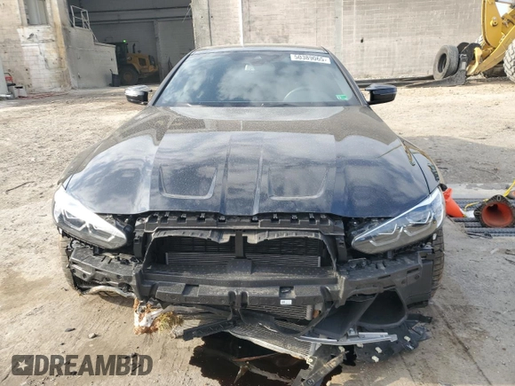 2023 BMW M4 Competition xDrive with VIN WBS43AZ05PCM59611, listed as a Copart auction lot 50389065 with 14,205 mi miles and Salvage title. Bid and sale history available at DreamBid. Image 5.
